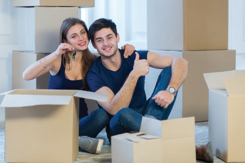 Furniture collection team handling bulky items in a Lambeth flat