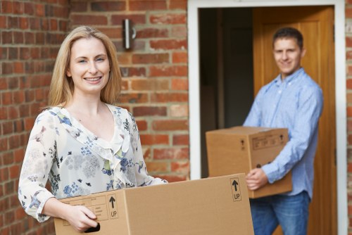 Packing and loading business equipment during a move in Lambeth