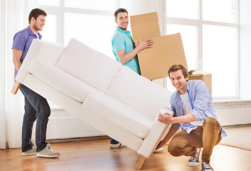 Professional team handling office furniture and equipment move in Lambeth