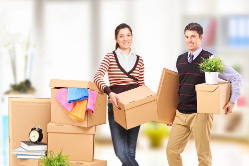 Careful wrapping of fragile household items during packing services in Lambeth
