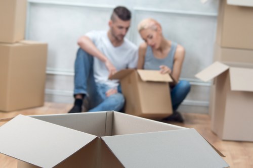 Moving team handling a Lambeth home relocation with boxes and furniture