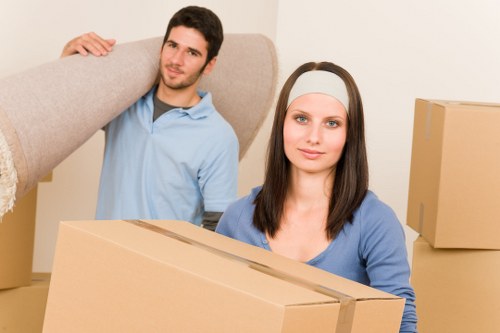 Household items being loaded into a removals vehicle